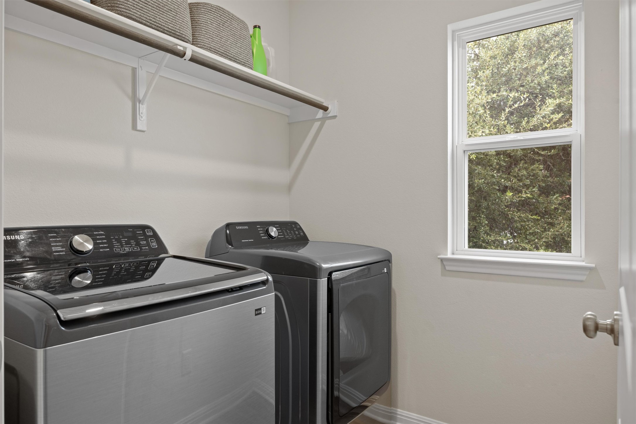 313 Toddy Way Leander, TX 78641 - Photo 22 of 40 a utility room with dryer and washer