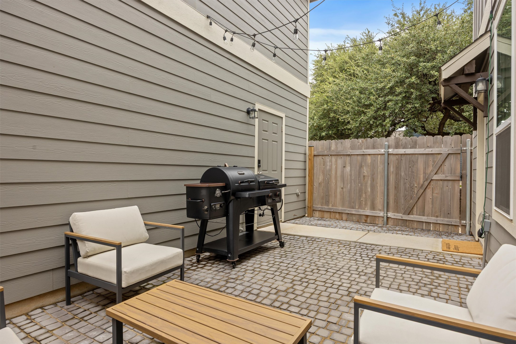 313 Toddy Way Leander, TX 78641 - Photo 32 of 40 a view of a patio with a table and chairs
