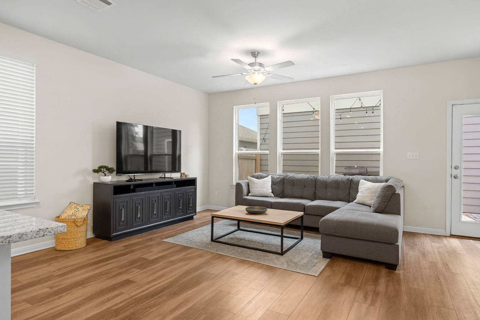 313 Toddy Way Leander, TX 78641 - Photo 9 of 40 a living room with furniture and a flat screen tv