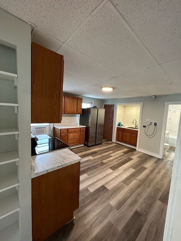 218 Vernon Street Worcester, MA 01607 - Photo 13 of 17 a view of kitchen with furniture and refrigerator