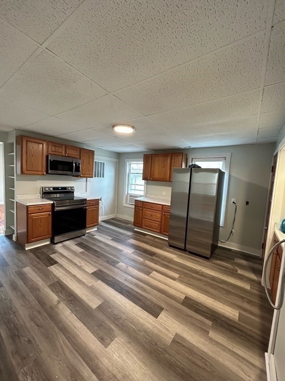 218 Vernon Street Worcester, MA 01607 - Photo 14 of 17 a view of kitchen with sink microwave and cabinets