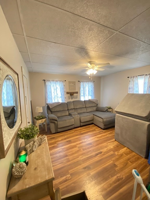 218 Vernon Street Worcester, MA 01607 - Photo 2 of 17 a living room with furniture and a flat screen tv