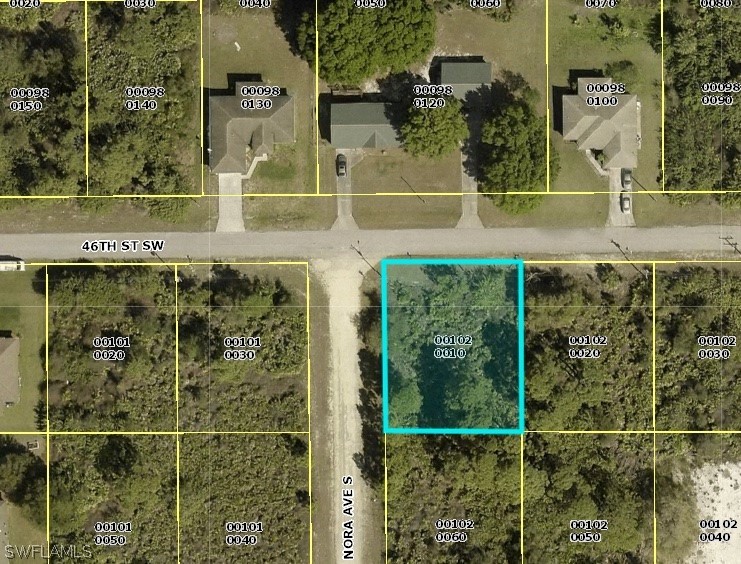 3105 46th Street Southwest Lehigh Acres, FL 33976 - Photo 1 of 1 an outdoor view of a building