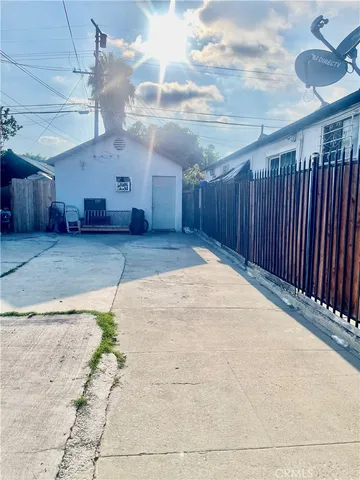 a view of a backyard of a house