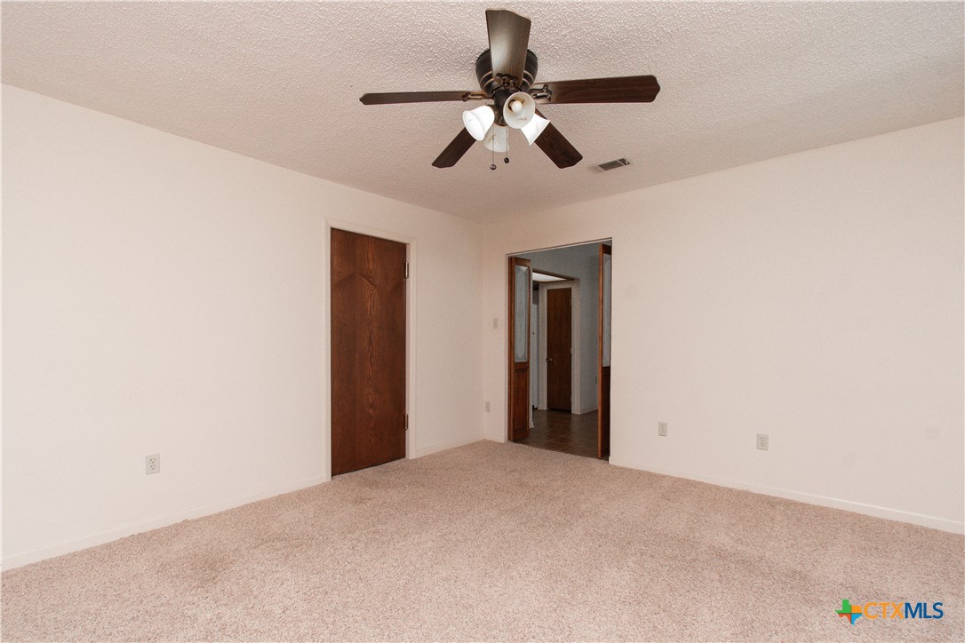 1 Timberline Drive Belton, TX 76513 - Photo 28 of 46 a view of a livingroom with a ceiling fan and window