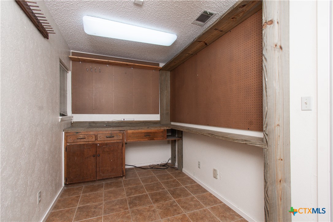 1 Timberline Drive Belton, TX 76513 - Photo 31 of 46 a bathroom with a sink and a mirror