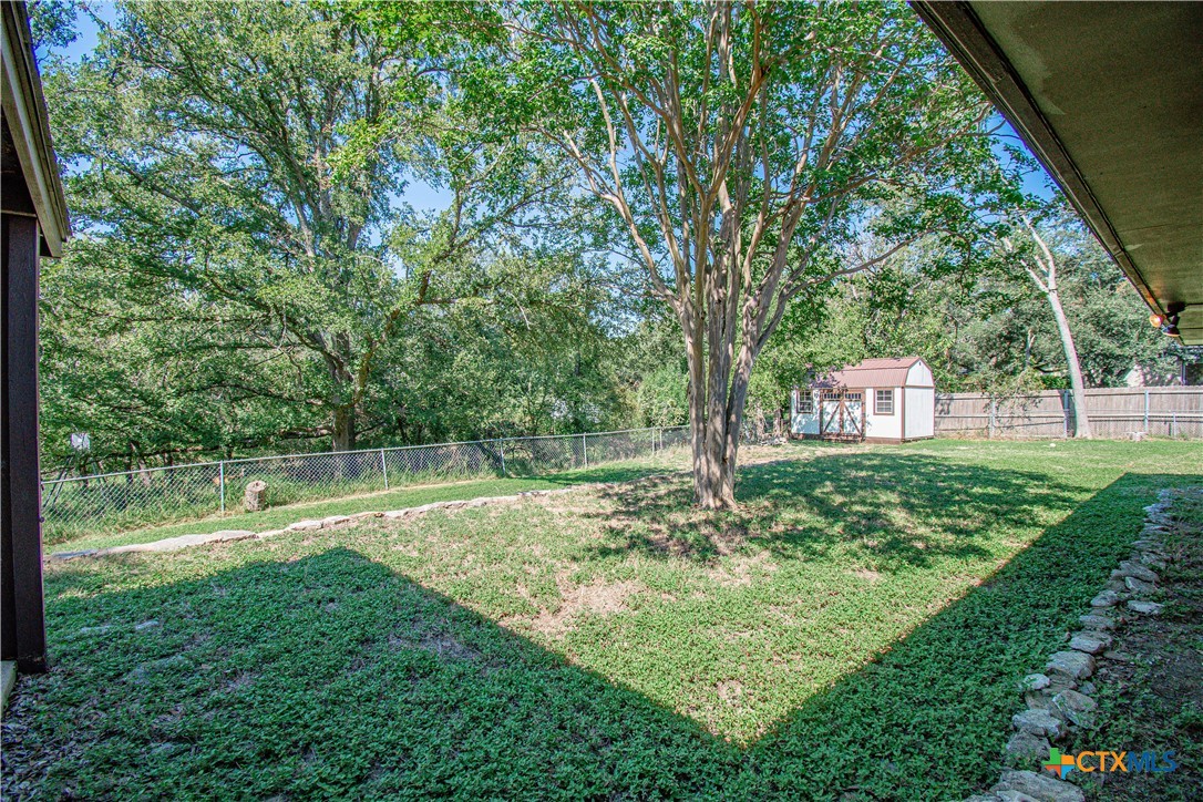 1 Timberline Drive Belton, TX 76513 - Photo 35 of 46 a view of a backyard with large trees