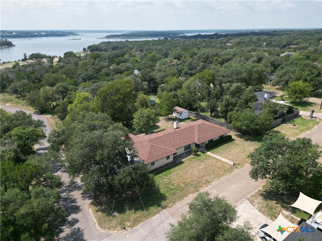 1 Timberline Drive Belton, TX 76513 - Photo 37 of 46 an aerial view of a house with a garden and lake view