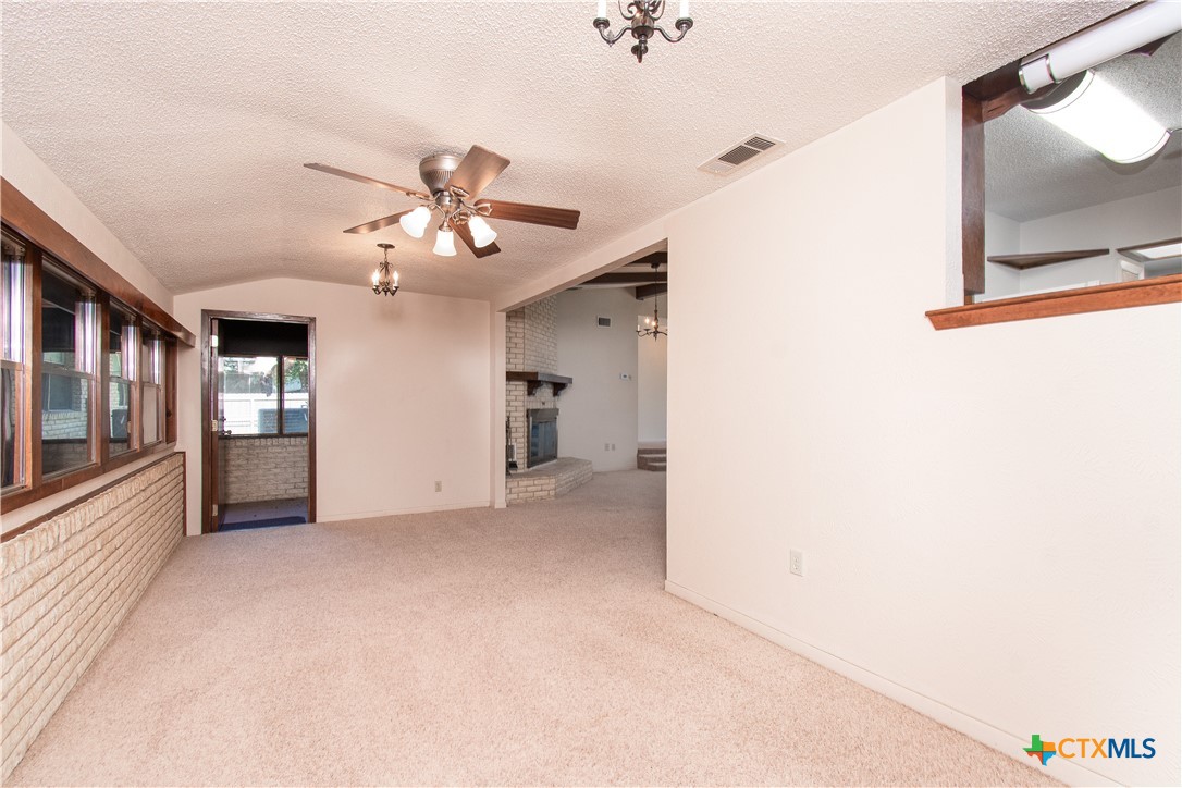 1 Timberline Drive Belton, TX 76513 - Photo 8 of 46 a view of a kitchen with a sink and a chandelier fan