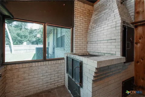 a view of a kitchen with a sink and dishwasher