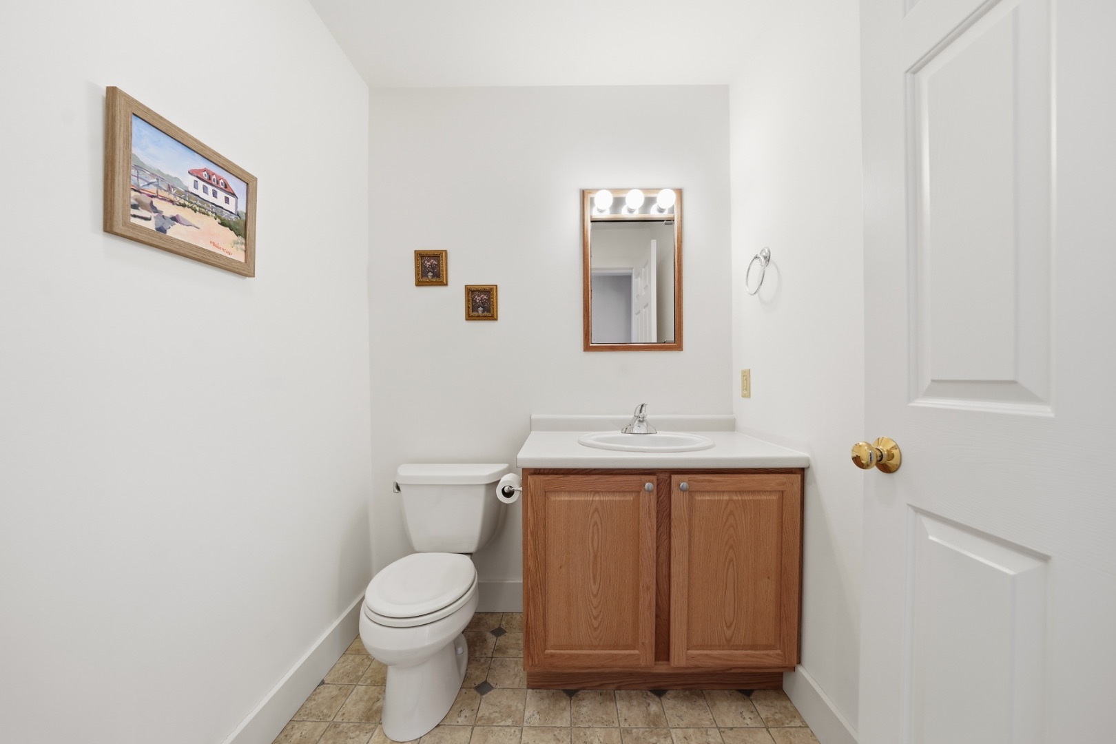 20 Rudder Lane Nantucket, MA 02554 - Photo 32 of 34 a bathroom with a toilet a sink and mirror
