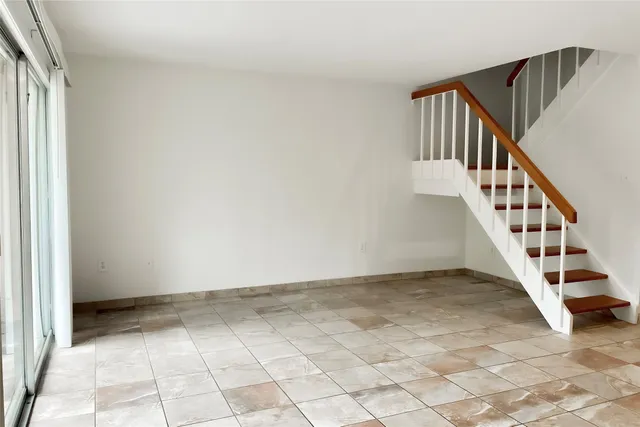 a view of an entryway with staircase