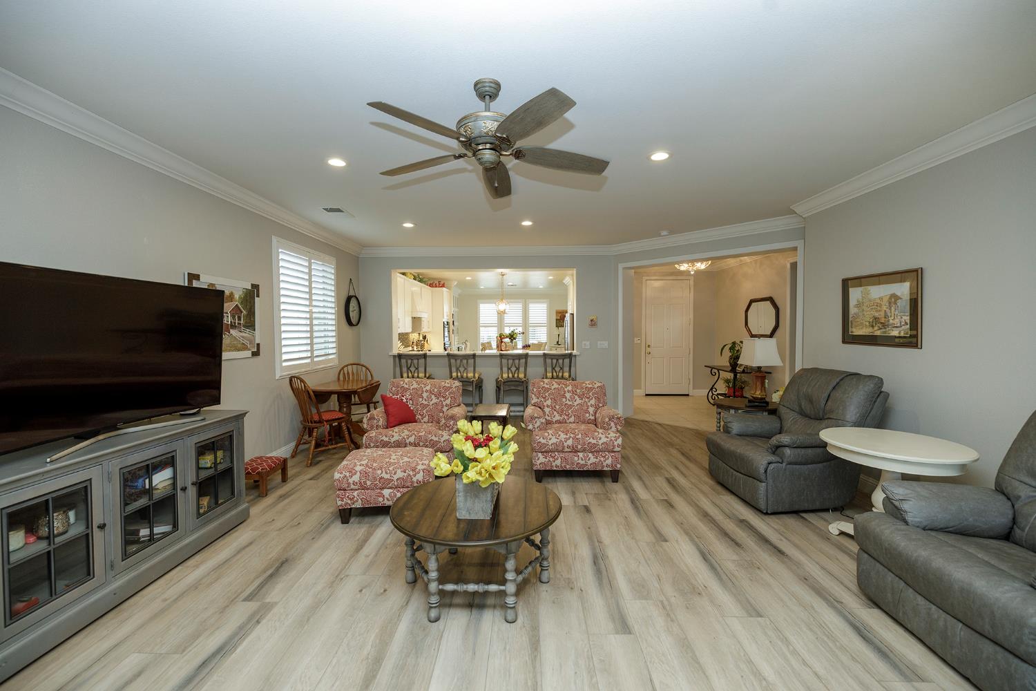 1771 Fox Trot Way Manteca, CA 95336 - Photo 14 of 54 a living room with furniture and a flat screen tv