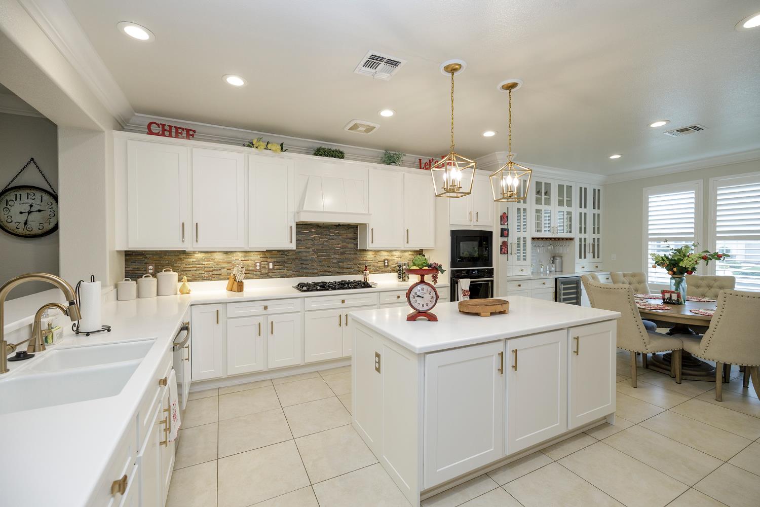 1771 Fox Trot Way Manteca, CA 95336 - Photo 17 of 54 a kitchen with a sink stove and cabinets