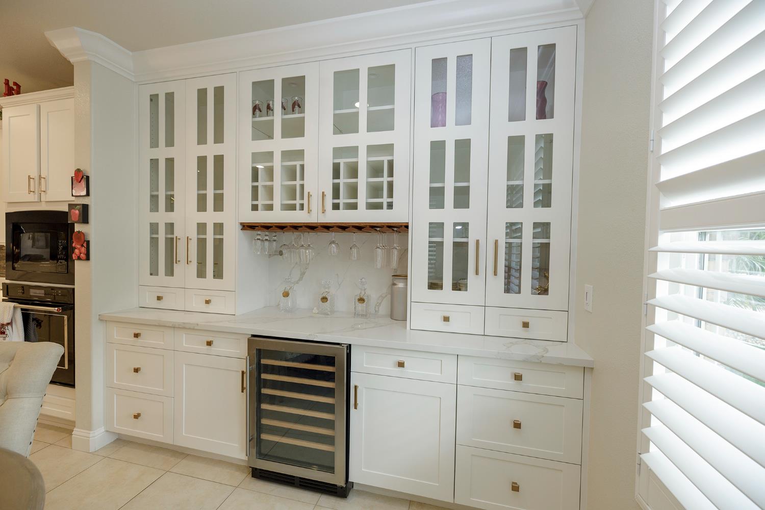 1771 Fox Trot Way Manteca, CA 95336 - Photo 23 of 54 a kitchen with white cabinets and window