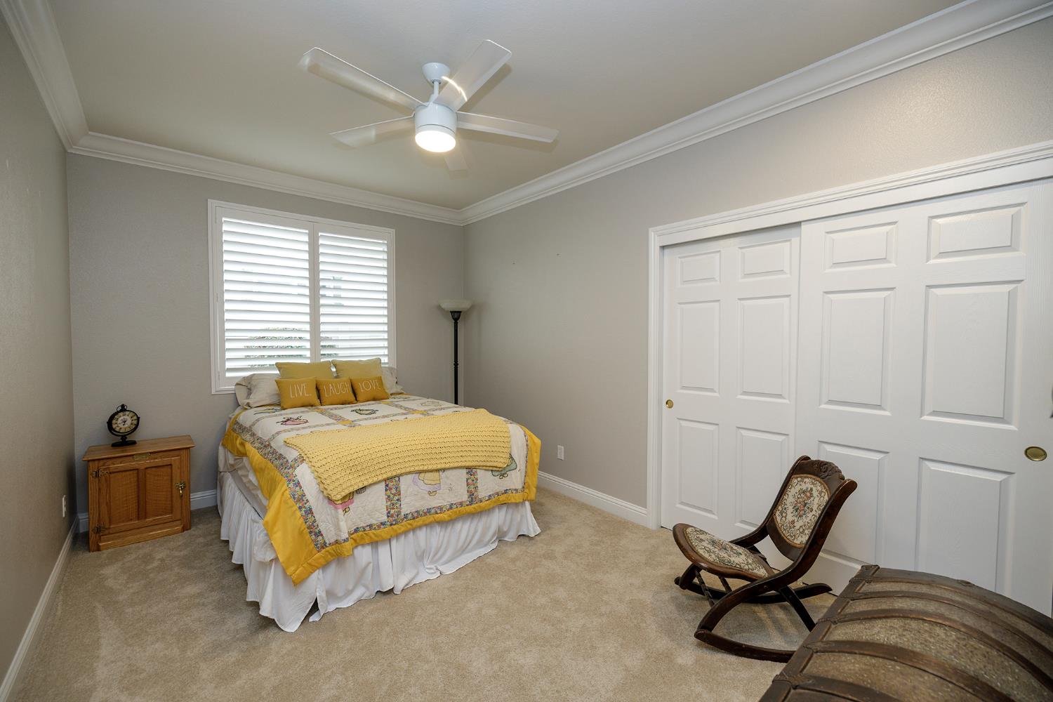 1771 Fox Trot Way Manteca, CA 95336 - Photo 34 of 54 a bedroom with a bed a chair and painting on the wall