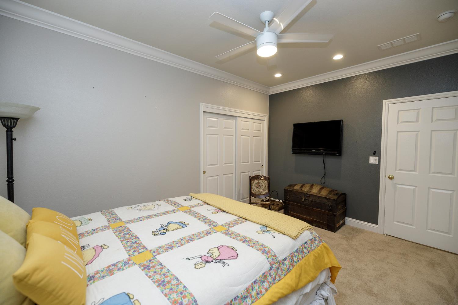 1771 Fox Trot Way Manteca, CA 95336 - Photo 35 of 54 a bedroom with a bed and a flat screen tv
