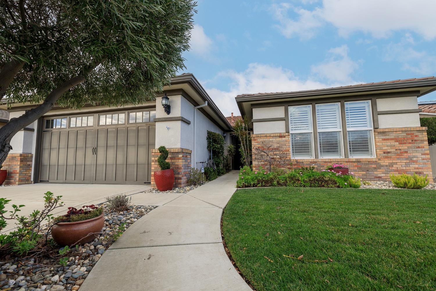 1771 Fox Trot Way Manteca, CA 95336 - Photo 4 of 54 a view of a house with backyard and porch