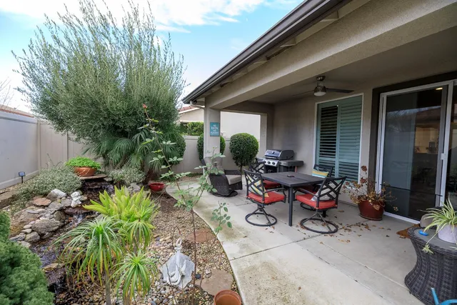 a view of front of house with outdoor seating