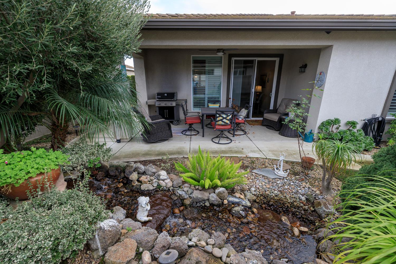 1771 Fox Trot Way Manteca, CA 95336 - Photo 45 of 54 a view of front of house with outdoor seating