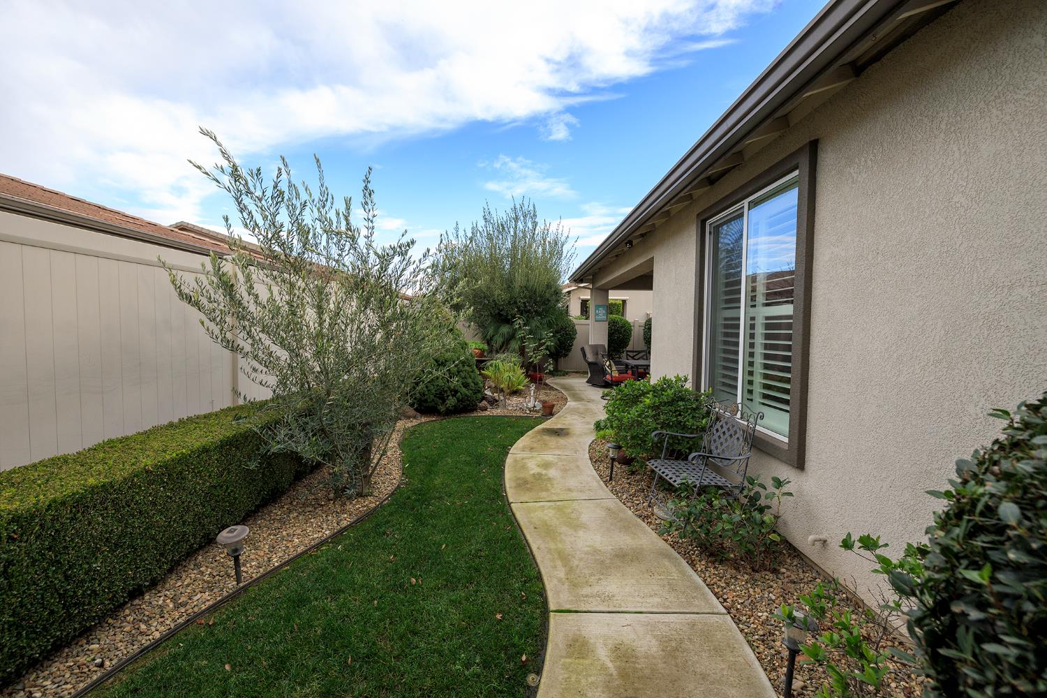 1771 Fox Trot Way Manteca, CA 95336 - Photo 50 of 54 a view of a house with a yard