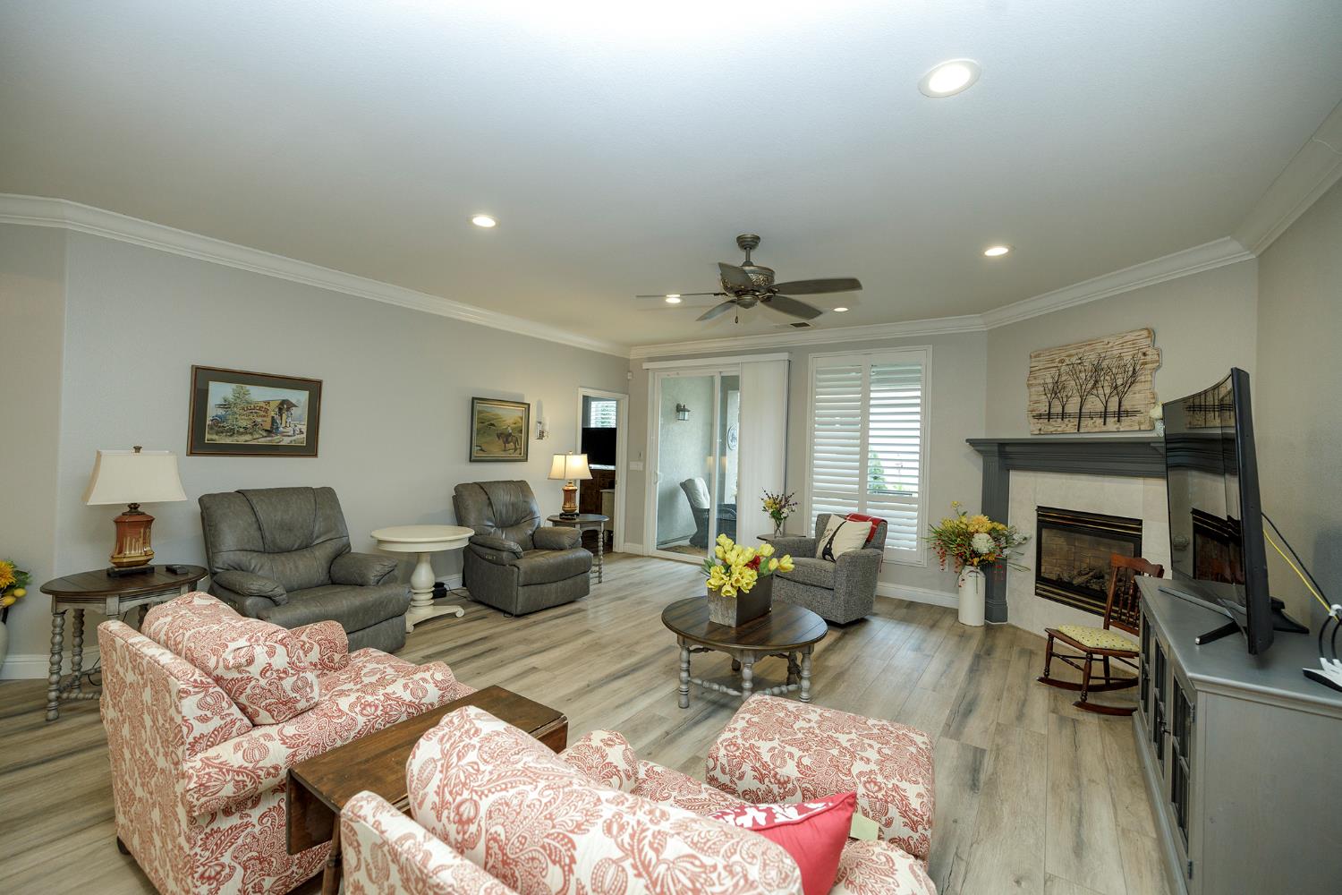1771 Fox Trot Way Manteca, CA 95336 - Photo 10 of 54 a living room with furniture and a fireplace
