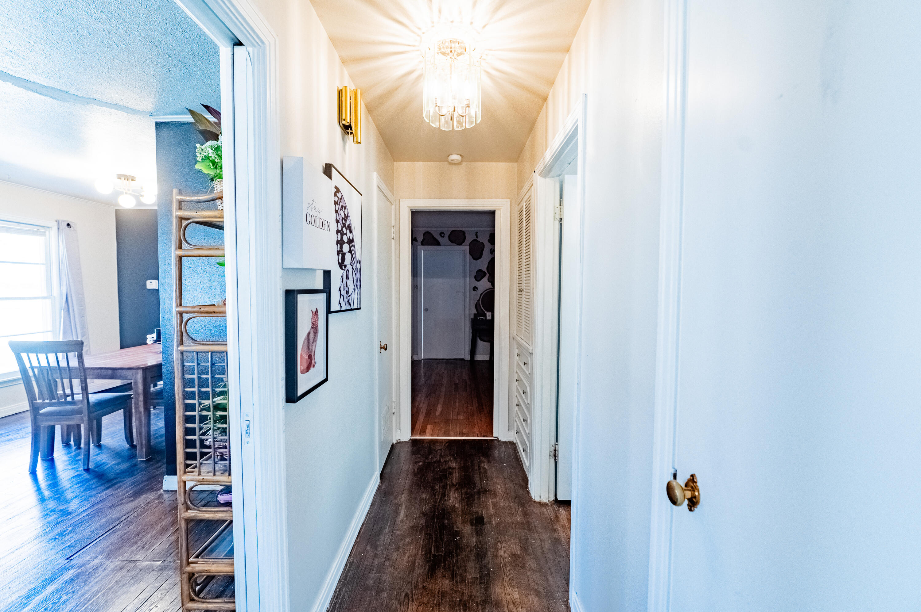 520 East 12th Street Littlefield, TX 79339 - Photo 8 of 17 a view of a hallway with wooden floor and staircase