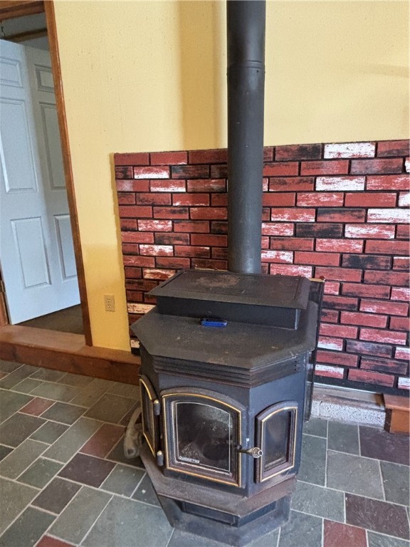 7944 State Street Oneonta, NY 13820 - Photo 23 of 41 Pellet stove for studio area