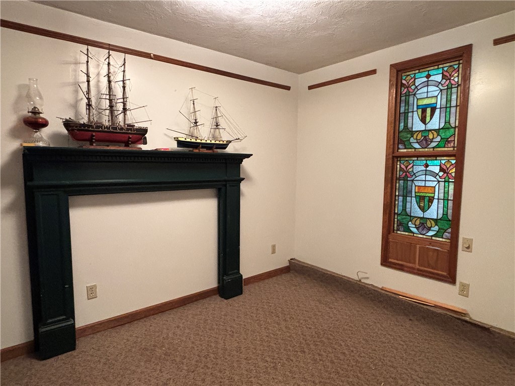 7944 State Street Oneonta, NY 13820 - Photo 25 of 41 Prop room in studio - stainglass windo does not co