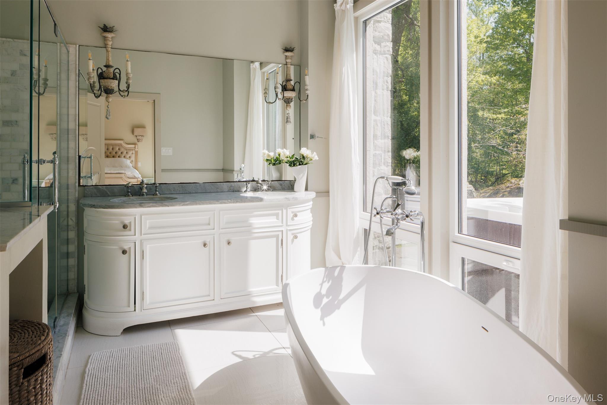 320 Long Hill Road Hopewell Junction, NY 12533 - Photo 17 of 42 a spacious bathroom with a granite countertop sink and a bathtub