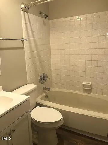 a bathroom with a sink a toilet and a bathtub