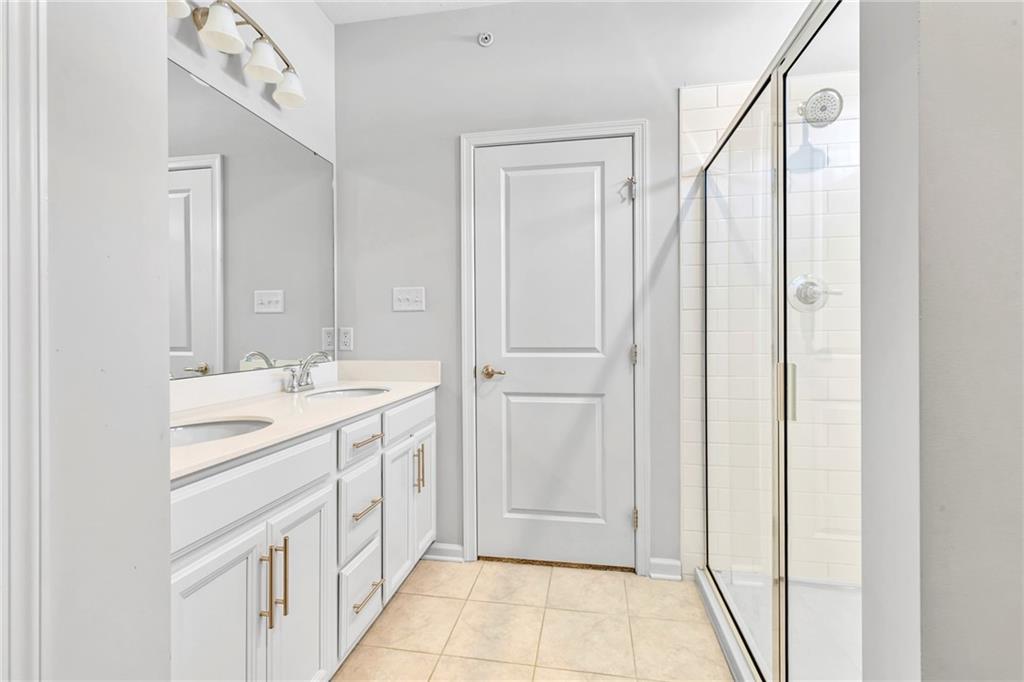 119 Rivulet Place Zelienople, PA 16063 - Photo 12 of 25 a bathroom with a double vanity sink and mirror