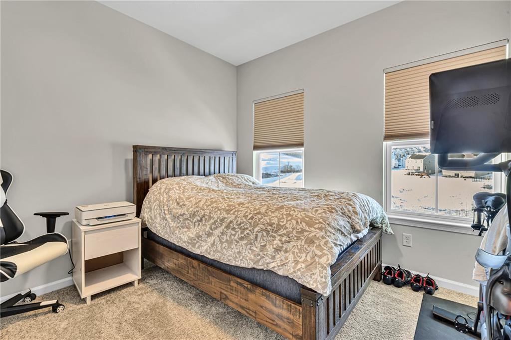 119 Rivulet Place Zelienople, PA 16063 - Photo 17 of 25 a bed sitting in a bedroom and tv