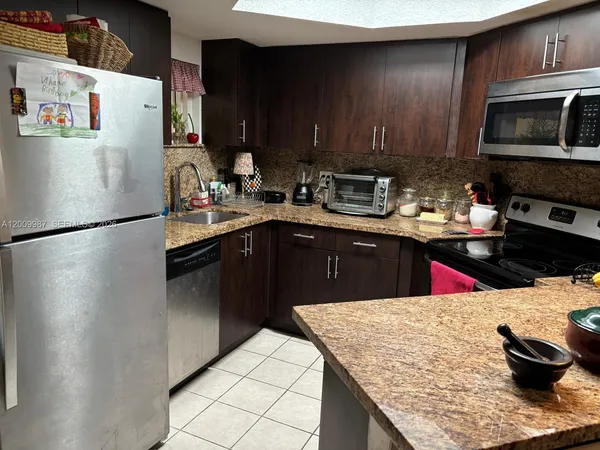 $268,000 | 8225 Lake Drive, Unit 404, Doral, FL 33166