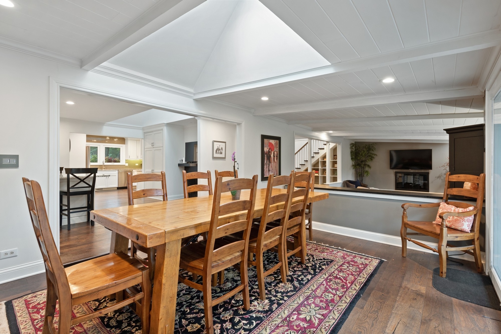 470 Voltz Road Northbrook, IL 60062 - Photo 13 of 58 a large dining space with furniture a rug and wooden floor