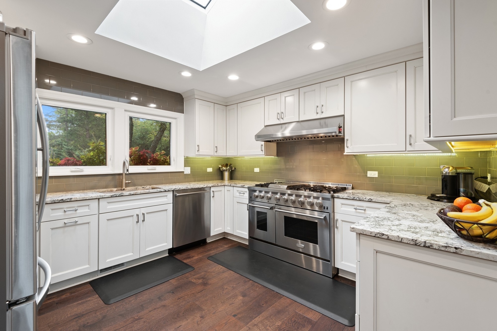 470 Voltz Road Northbrook, IL 60062 - Photo 18 of 58 a kitchen with granite countertop a sink stainless steel appliances and cabinets