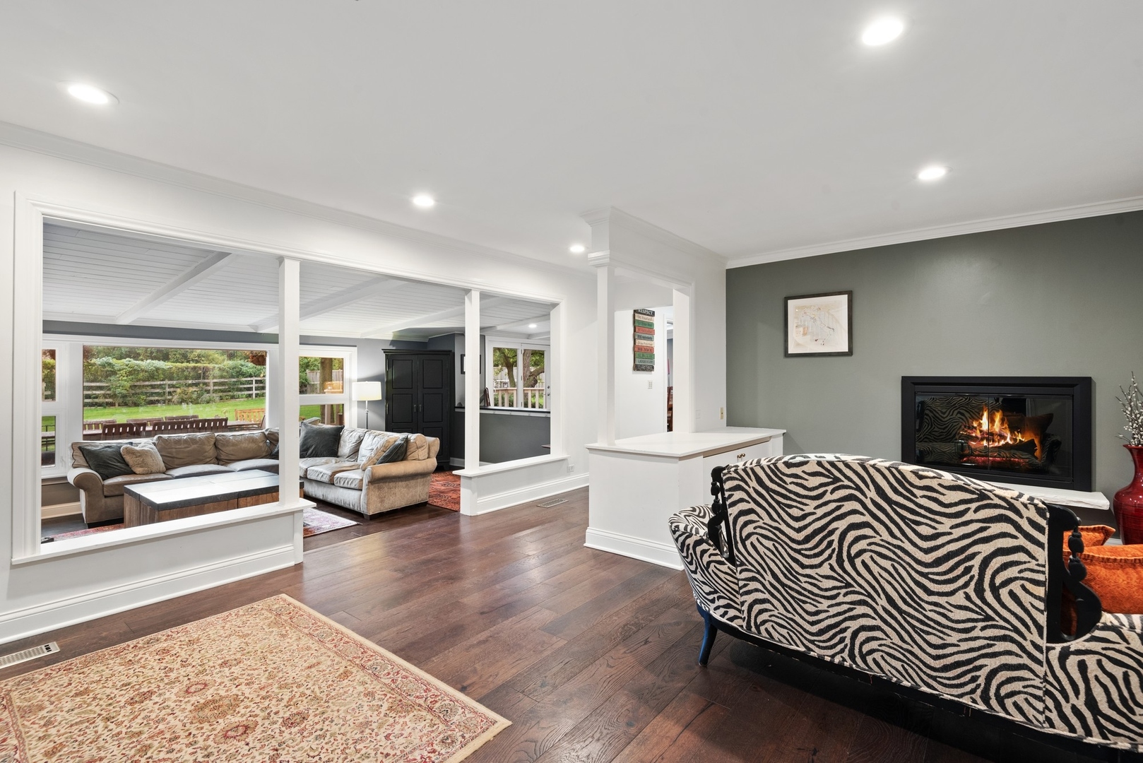 470 Voltz Road Northbrook, IL 60062 - Photo 8 of 58 a living room with furniture and a fireplace