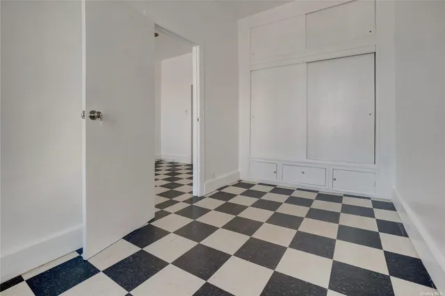 a black and white checkered floor with a black white checkered floor