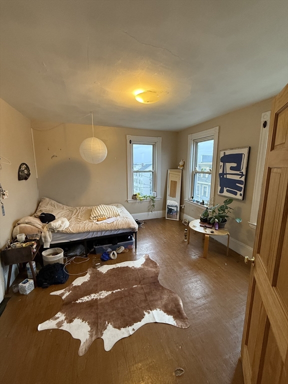 10 Eldora Street Boston, MA 02120 - Photo 15 of 26 a living room with furniture and a table