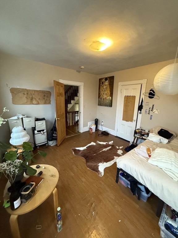 10 Eldora Street Boston, MA 02120 - Photo 16 of 26 a living room with furniture and a table