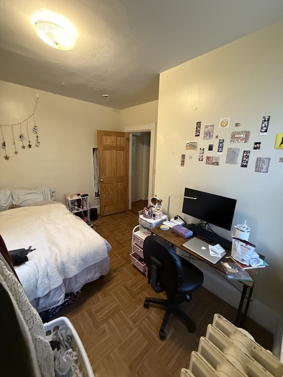 10 Eldora Street Boston, MA 02120 - Photo 18 of 26 a bedroom with bed and a window