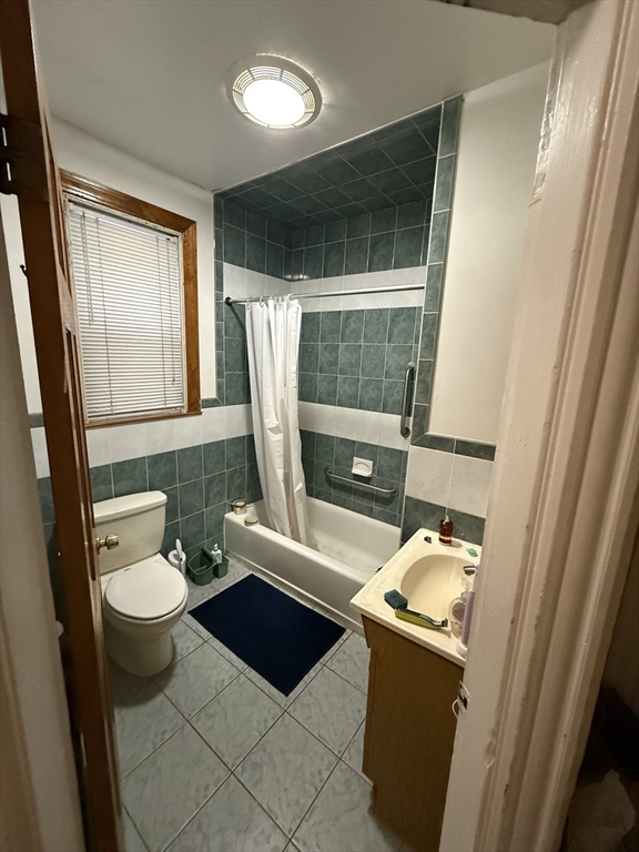 10 Eldora Street Boston, MA 02120 - Photo 21 of 26 a bathroom with a sink toilet and shower