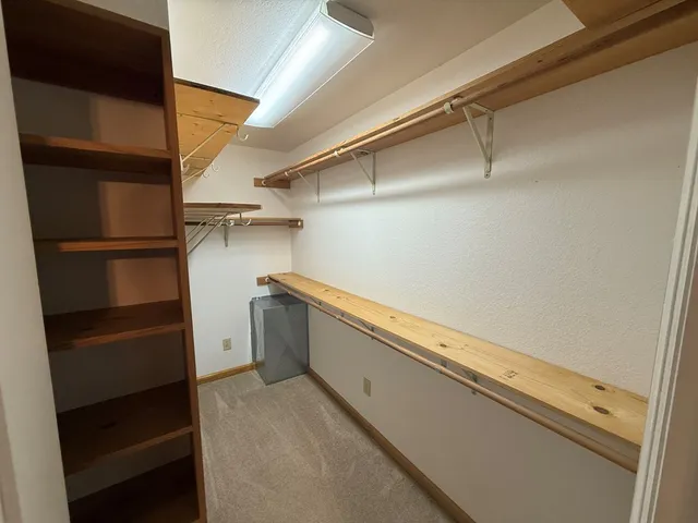 a bath tub sitting next to a shower