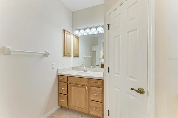 a bathroom with a bathtub and window