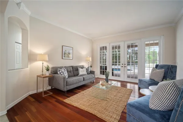 a kitchen with stainless steel appliances granite countertop a sink counter space cabinets and a large window