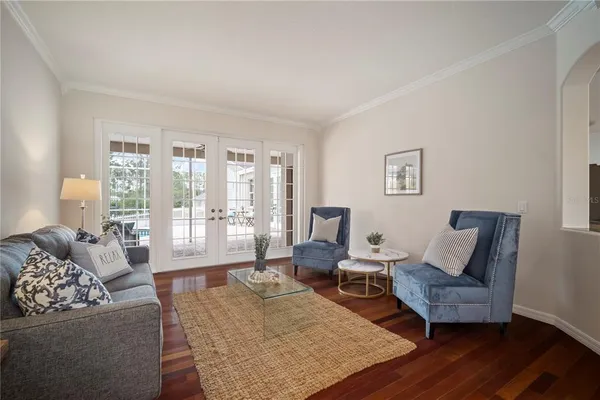 a view of an empty room and wooden floor