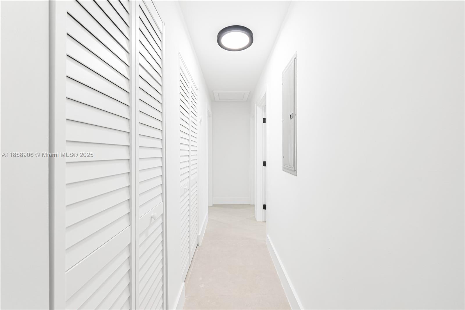 11835 Southwest 37th Street Miami, FL 33175 - Photo 25 of 47 a view of a hallway with wooden floor