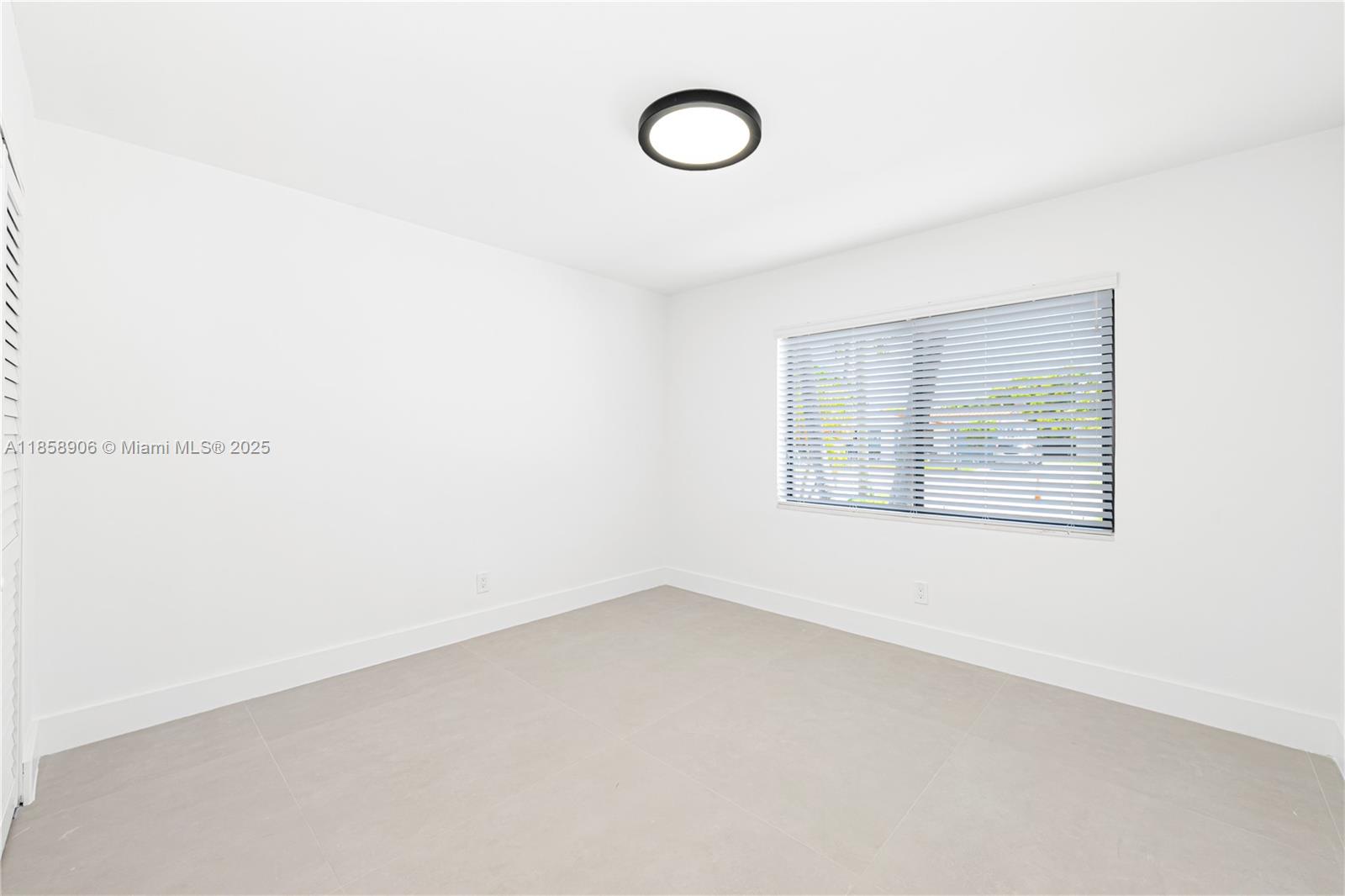11835 Southwest 37th Street Miami, FL 33175 - Photo 27 of 47 a view of an empty room