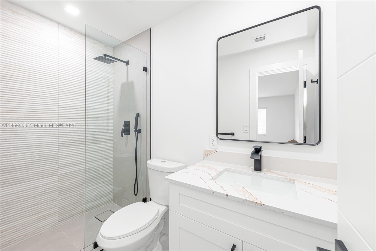 11835 Southwest 37th Street Miami, FL 33175 - Photo 30 of 47 a bathroom with a sink toilet and shower