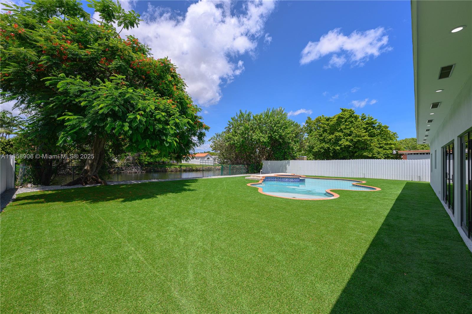11835 Southwest 37th Street Miami, FL 33175 - Photo 33 of 47 a view of a yard with a house